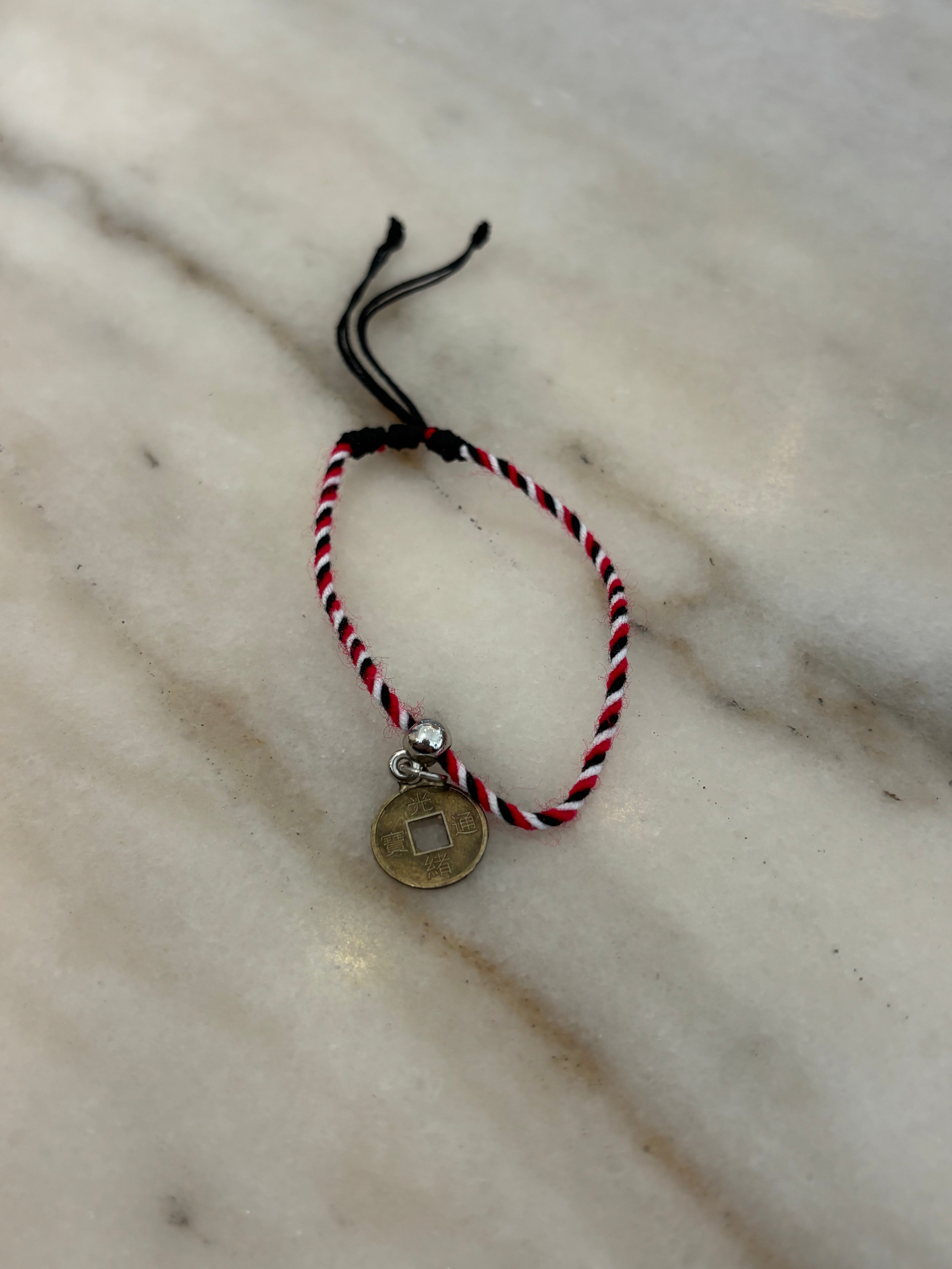 Bracelet Tridatu koin